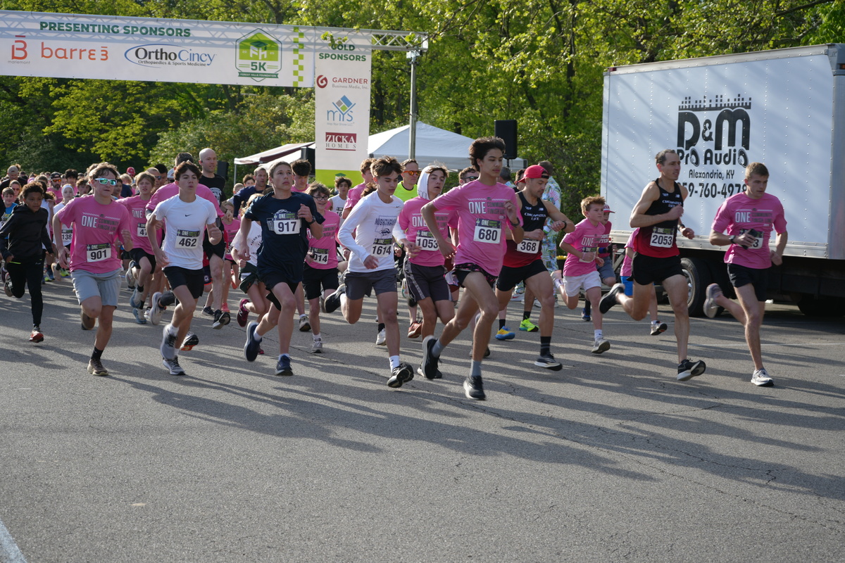 Runners take off at the starting line of the annual FH5K, organized by the Forest Hills Foundation for Education.